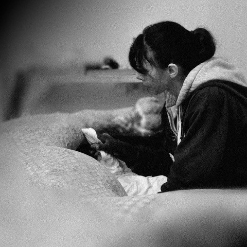 Woman working on a sculpture