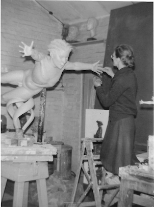 Rose Gwynneth Holt FRBS (1909-1995) working on West Wind in her studio