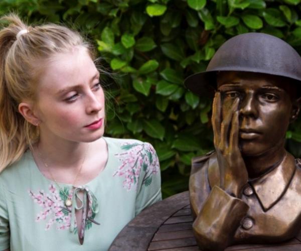 Ellie Grigsby alongside the memorial at Queen Mary’s Hospital, Sidcup.