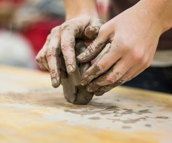 Hands in clay