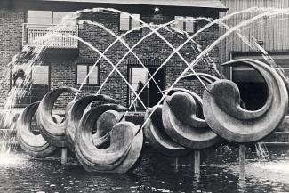 The Leap by Franta Belsky depicting eight dolphins, Blackwall Basin, Manchester Road, Isle of Dogs, London