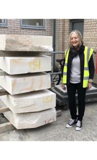 Glynis Owen FRSS checking out limestone blocks at Chichester Stoneworks in 2020