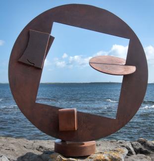 Steel sculpture by Robert Jones MRSS by the sea in the Isle of Man