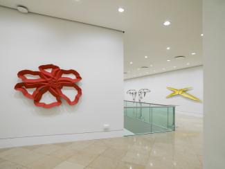 Facets at Kings Place on the Mezzanine Floor. Fron Left to right: Red, Petrified, Yellow Cracked Earth, steel wall sculptures from mid nineties