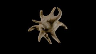 Still from Dirty Secret Clay stop frame animated film - later kiln fired as ceramic sculpture