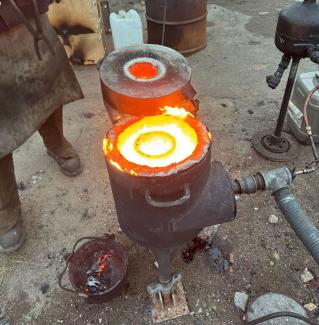 Portable waste vegetable oil furnace at work during Coles Castings’ 2024 Melbury Meltdown