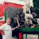 Glynn Williams FRSS next to a large truck onto which his sculpture Sophie has been loaded