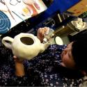 Ikuko in her studio making a sculptural teapot