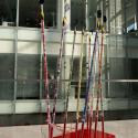 Sculpture with mobile phones and coloured poles by Artist Louise Ward Morris on show at Clifford Chance
