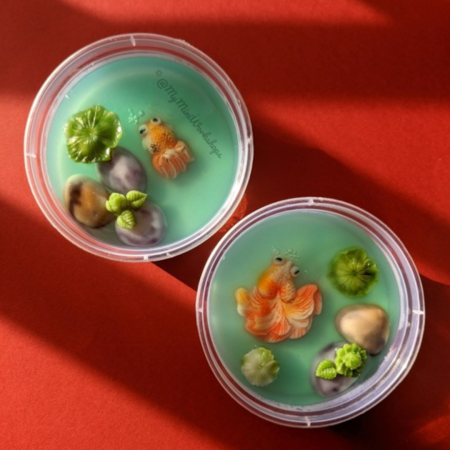 Koi Fishpond Jellies in bowls against a red background